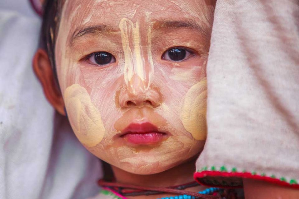 burmese child with paint