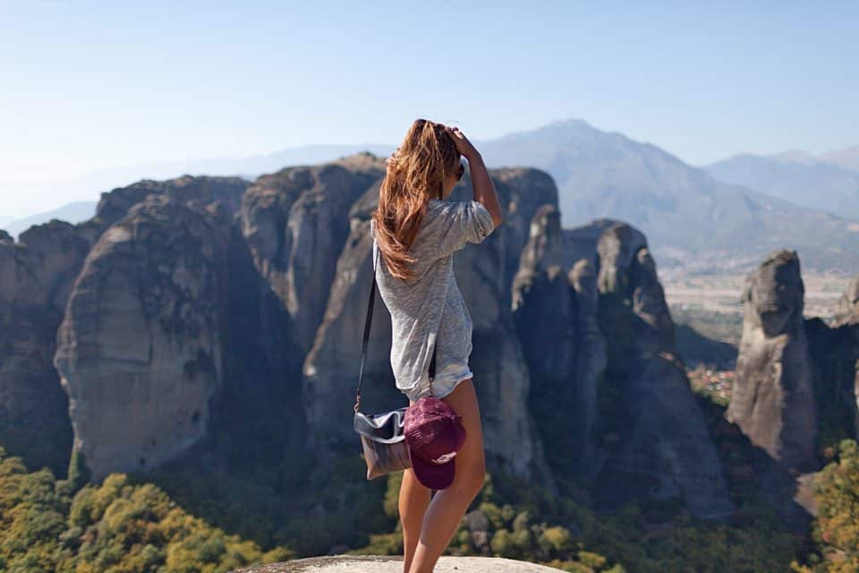 A woman looking at mountain views