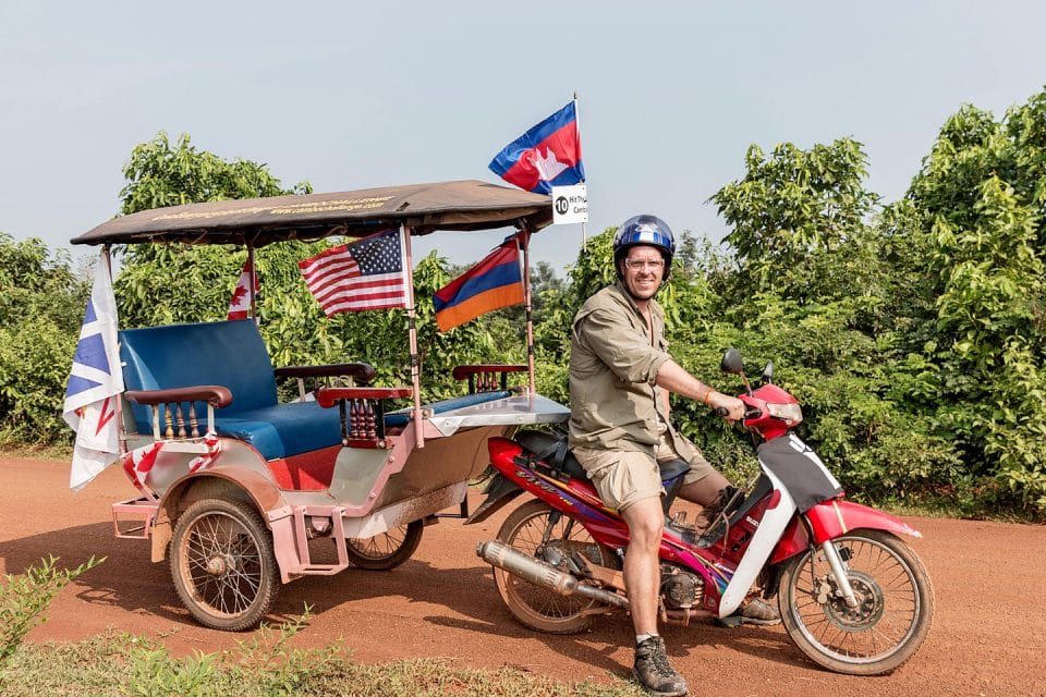 Riding a Cambodian tuk tuk down a dirt road