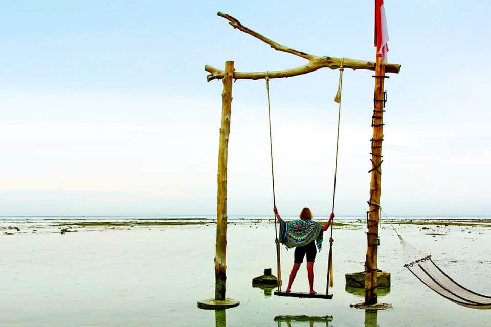 On the famous swing on Gili T, Indonesia