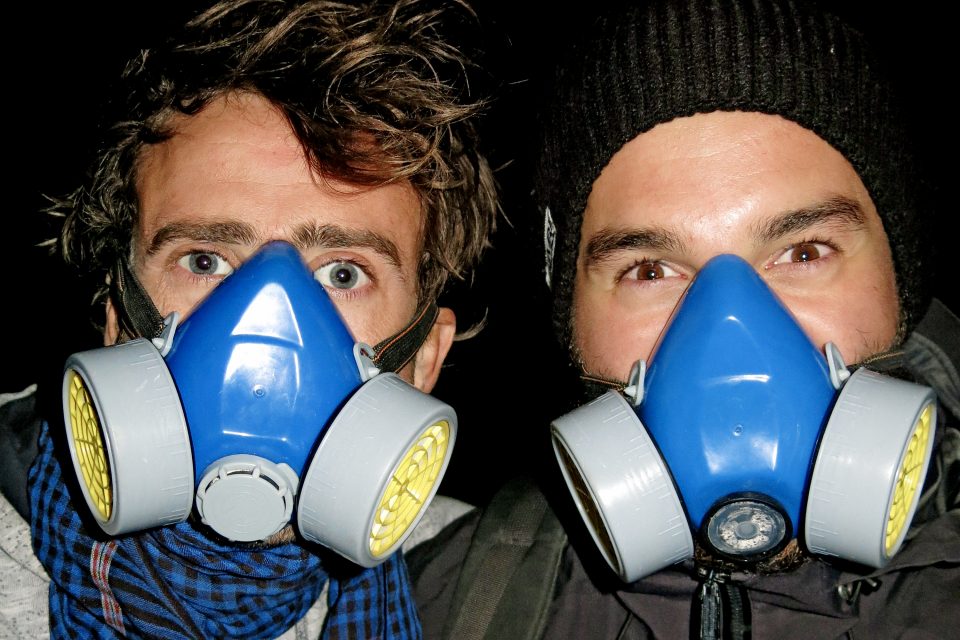 Men with gas masks on