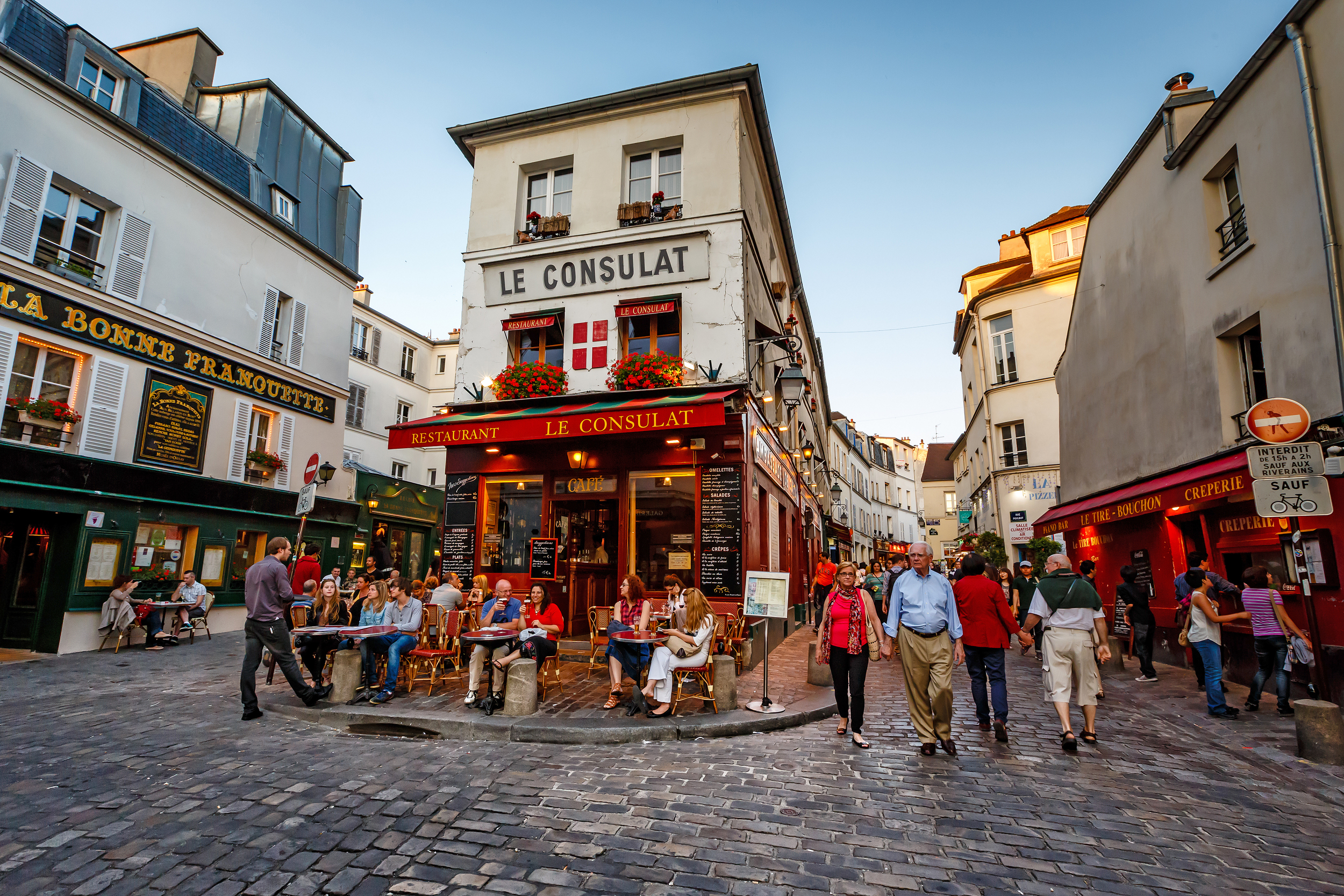 A local street in Paris full of restaurants