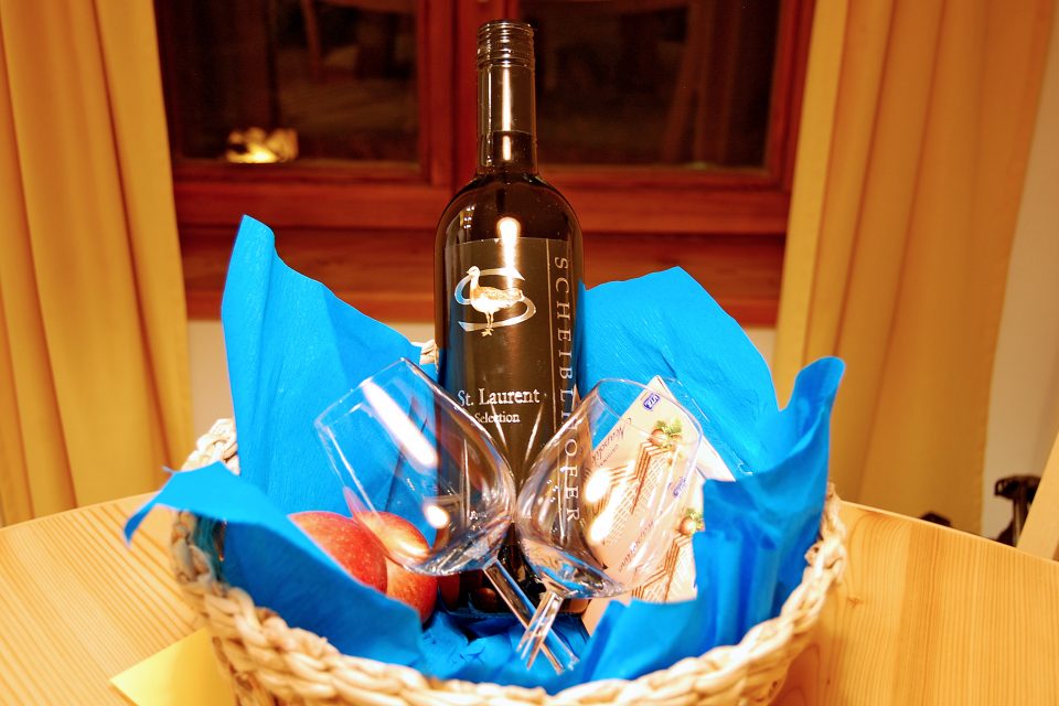 Hotel welcome basket with wine