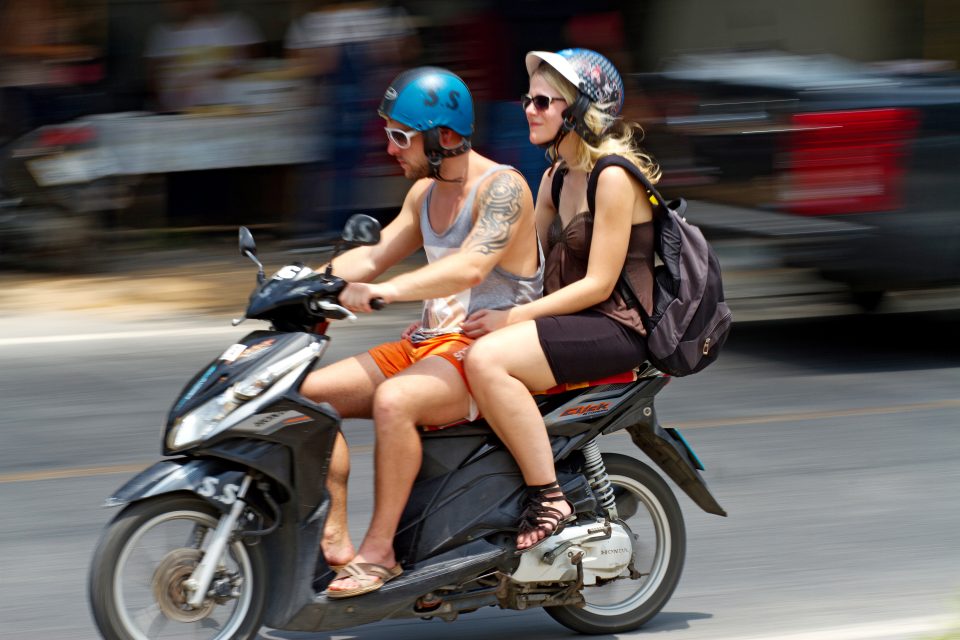 A couple on a motorbike