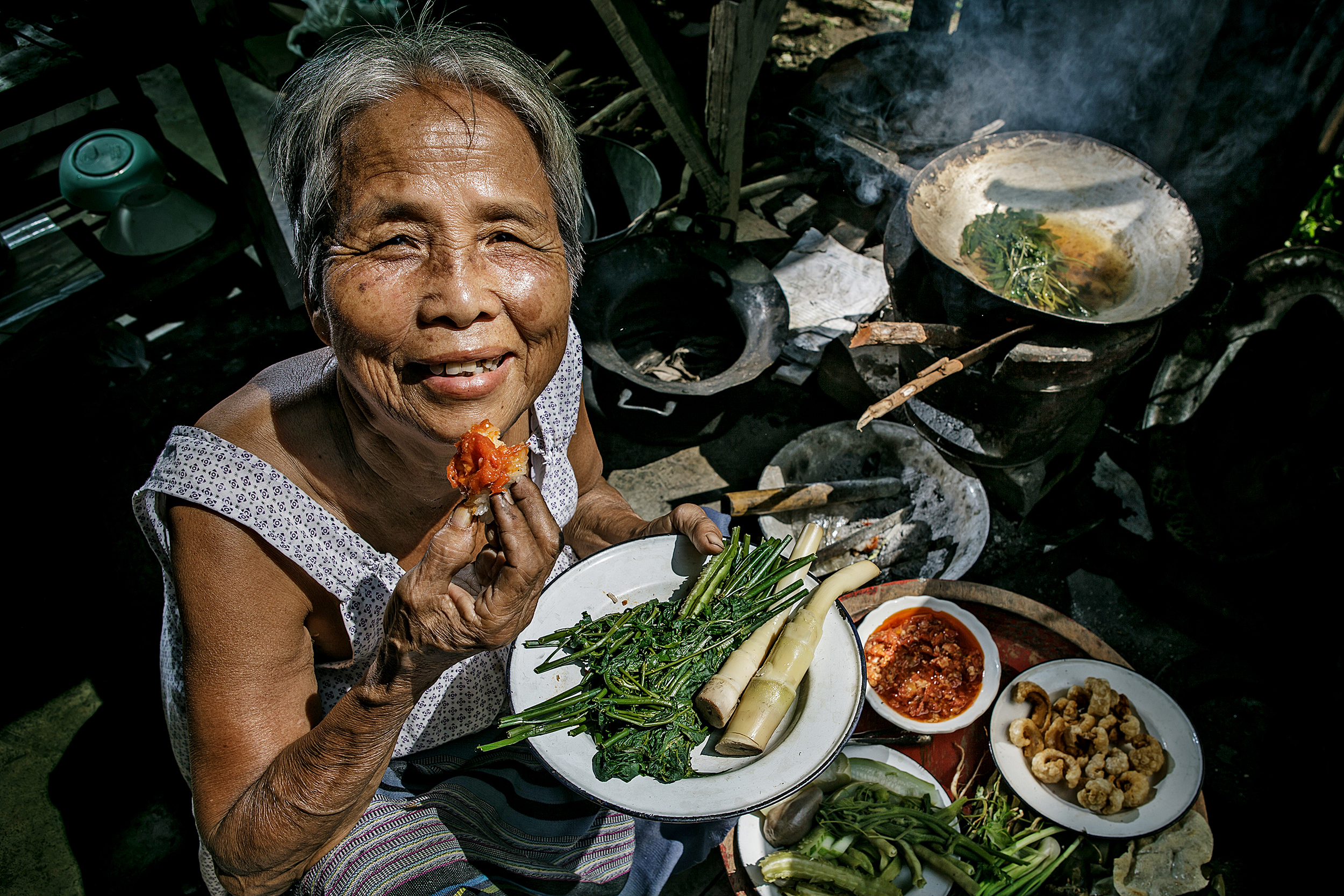 A local woman eating food