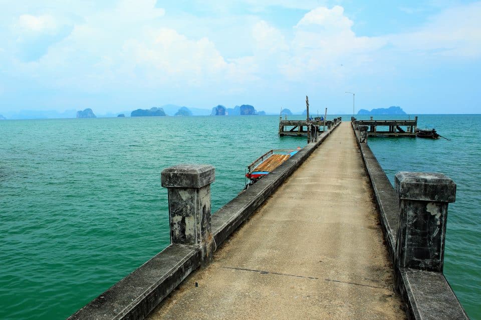 A long pier leading into the sea