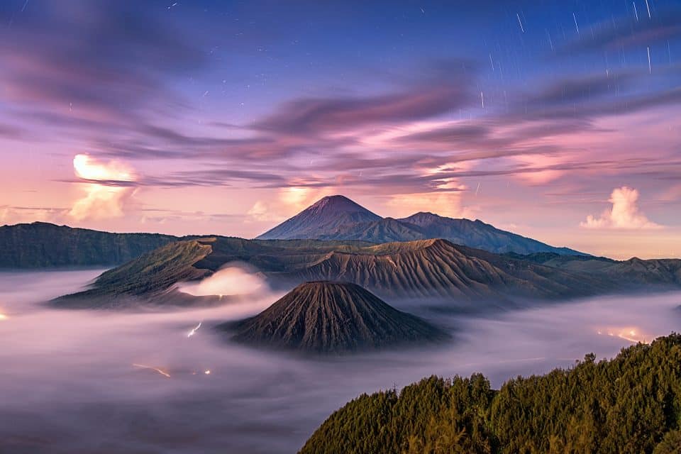 Volcano peaks through clouds