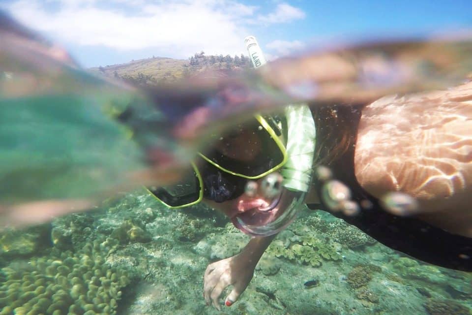 girl snorkeling underwater