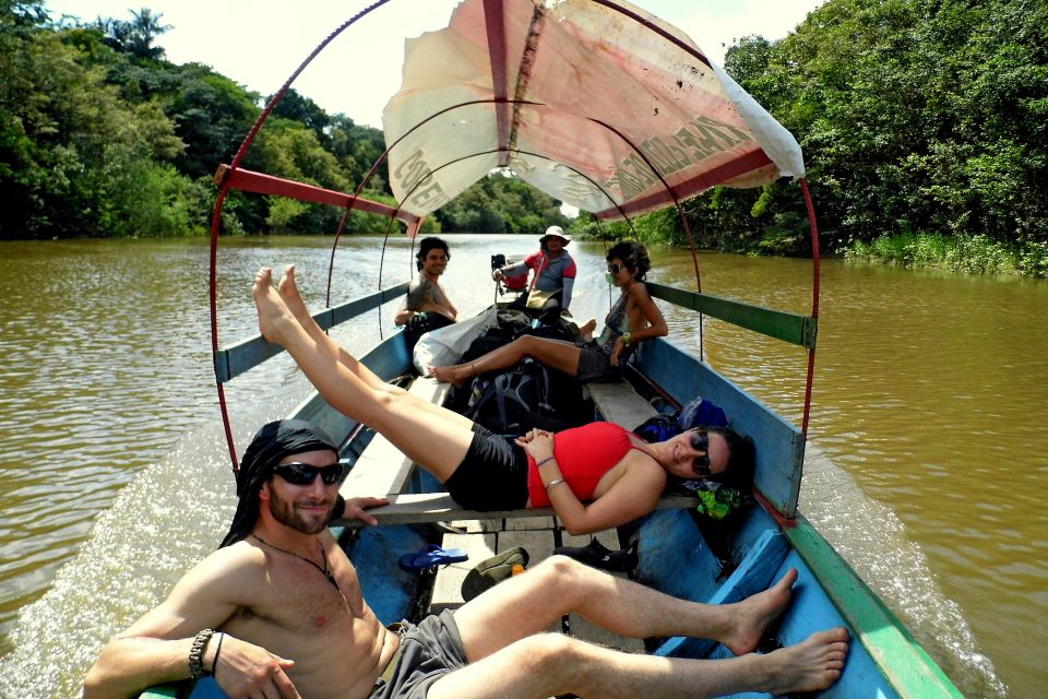 A group of people relaxing on a boat