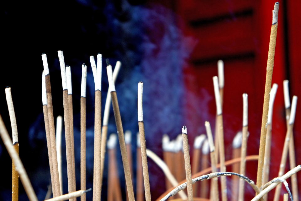 Close up of burning incense sticks