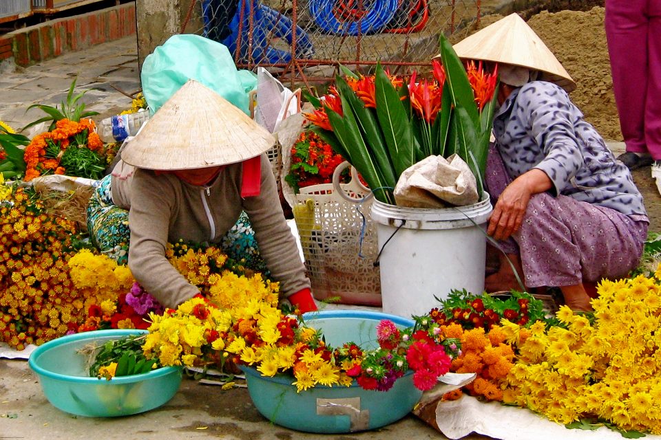 Local women selling flowers