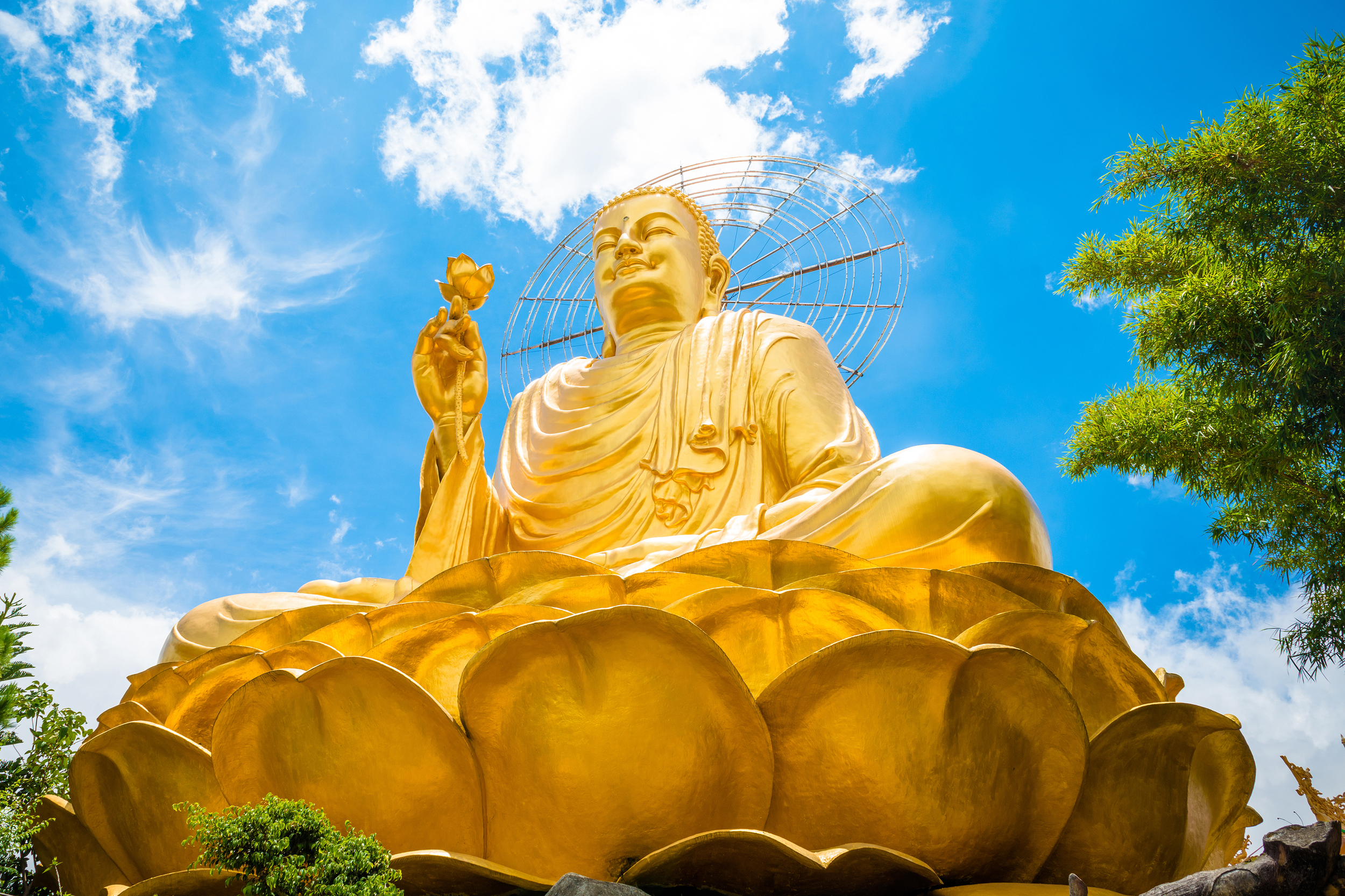 Upwards view of a giant golden buddha