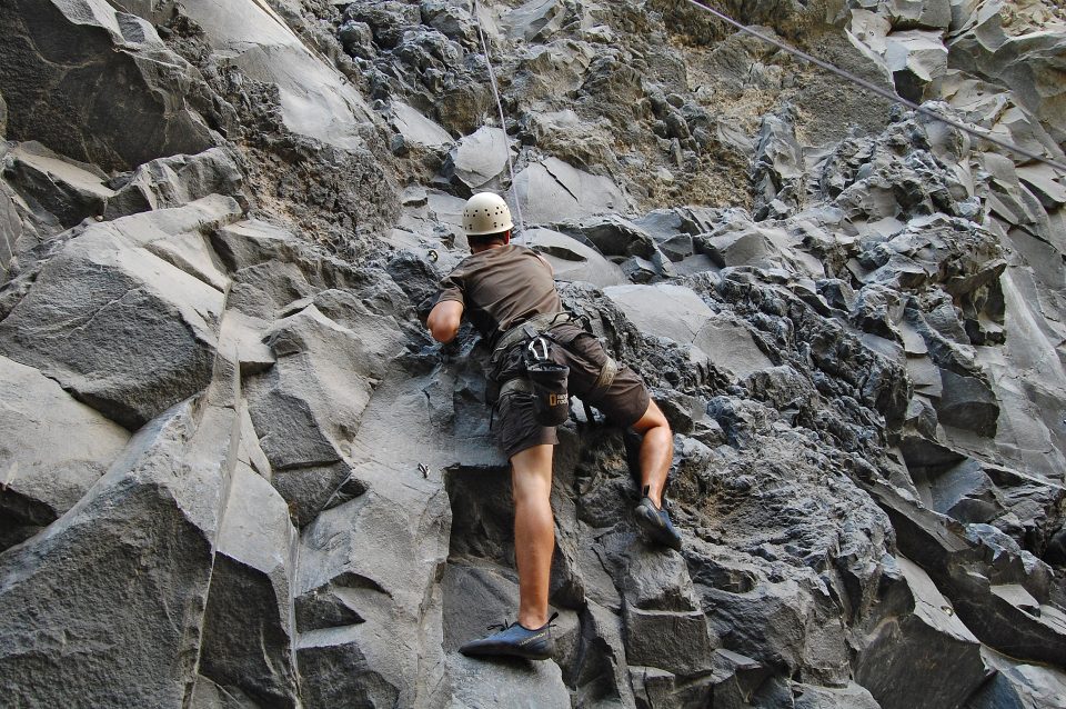 Tom rock climbing in Banos