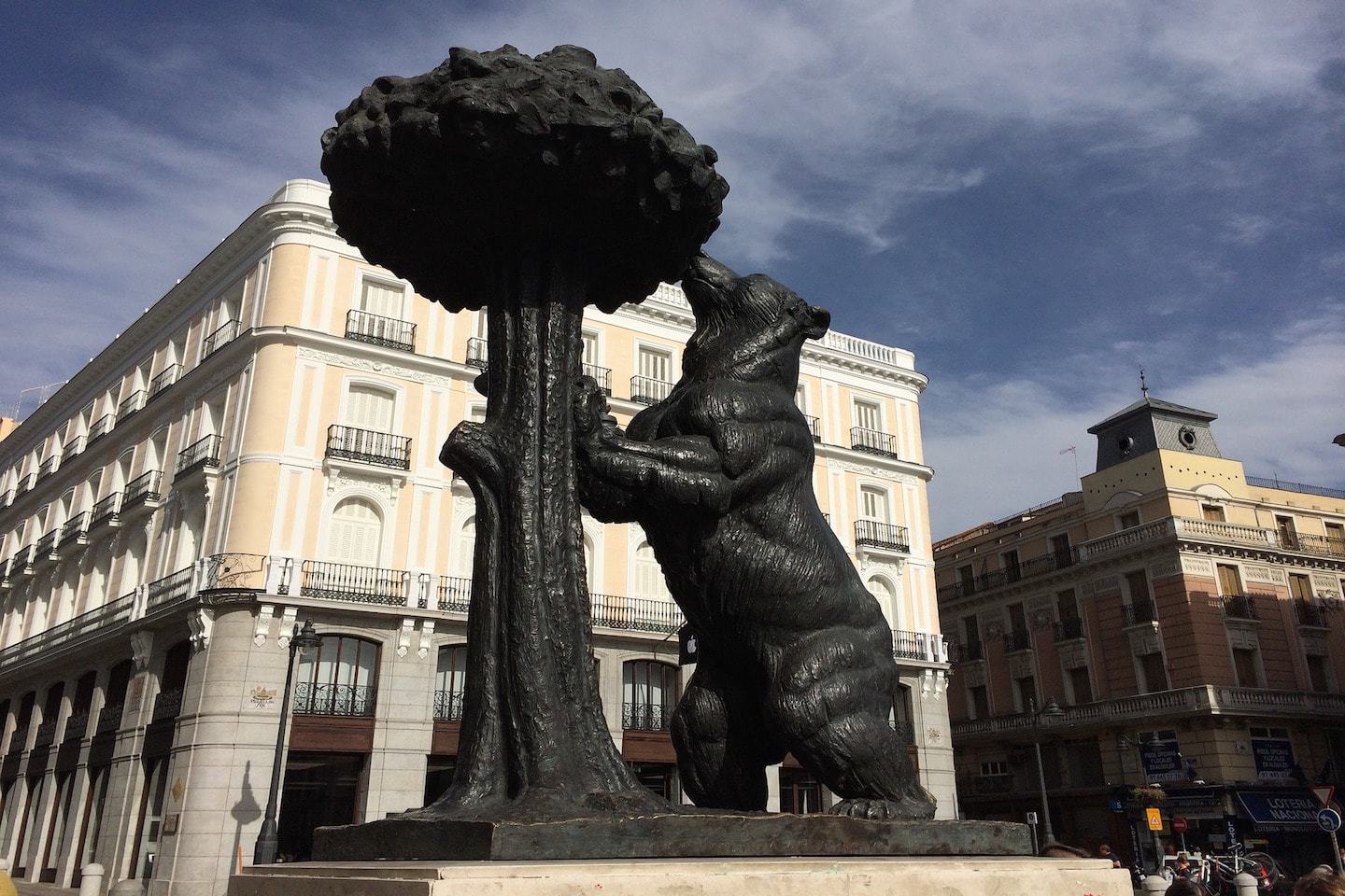 statue of a bear eating out of a tree in madrid spain
