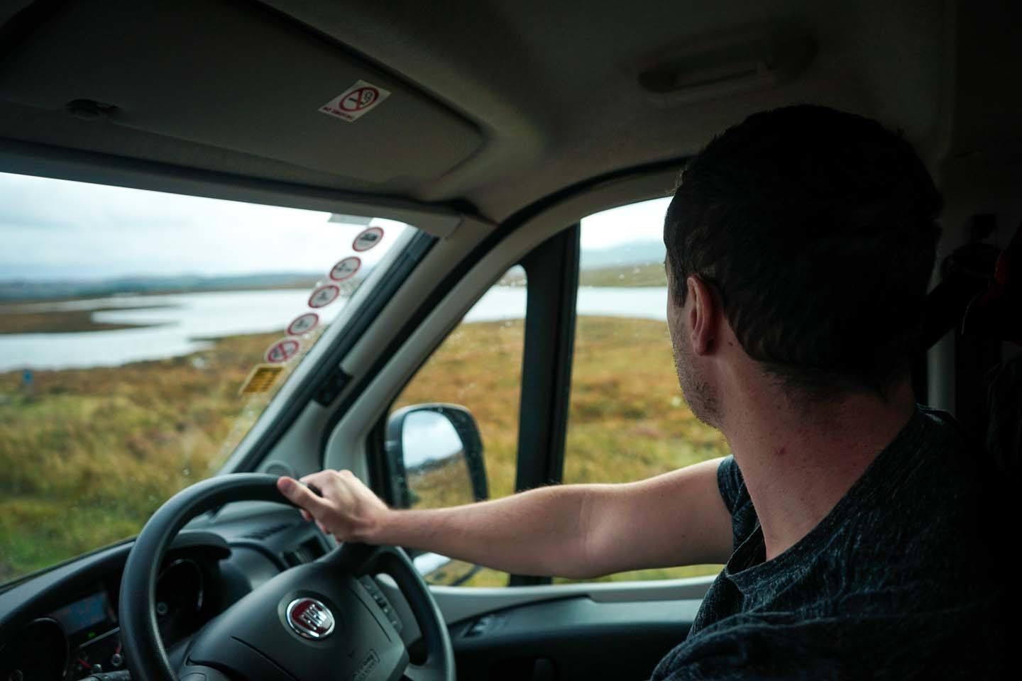 Man driving North Coast 500 Scotland