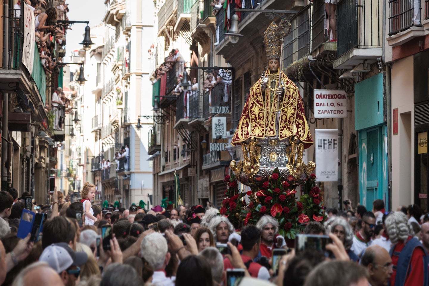 crowded street during festival in Spain