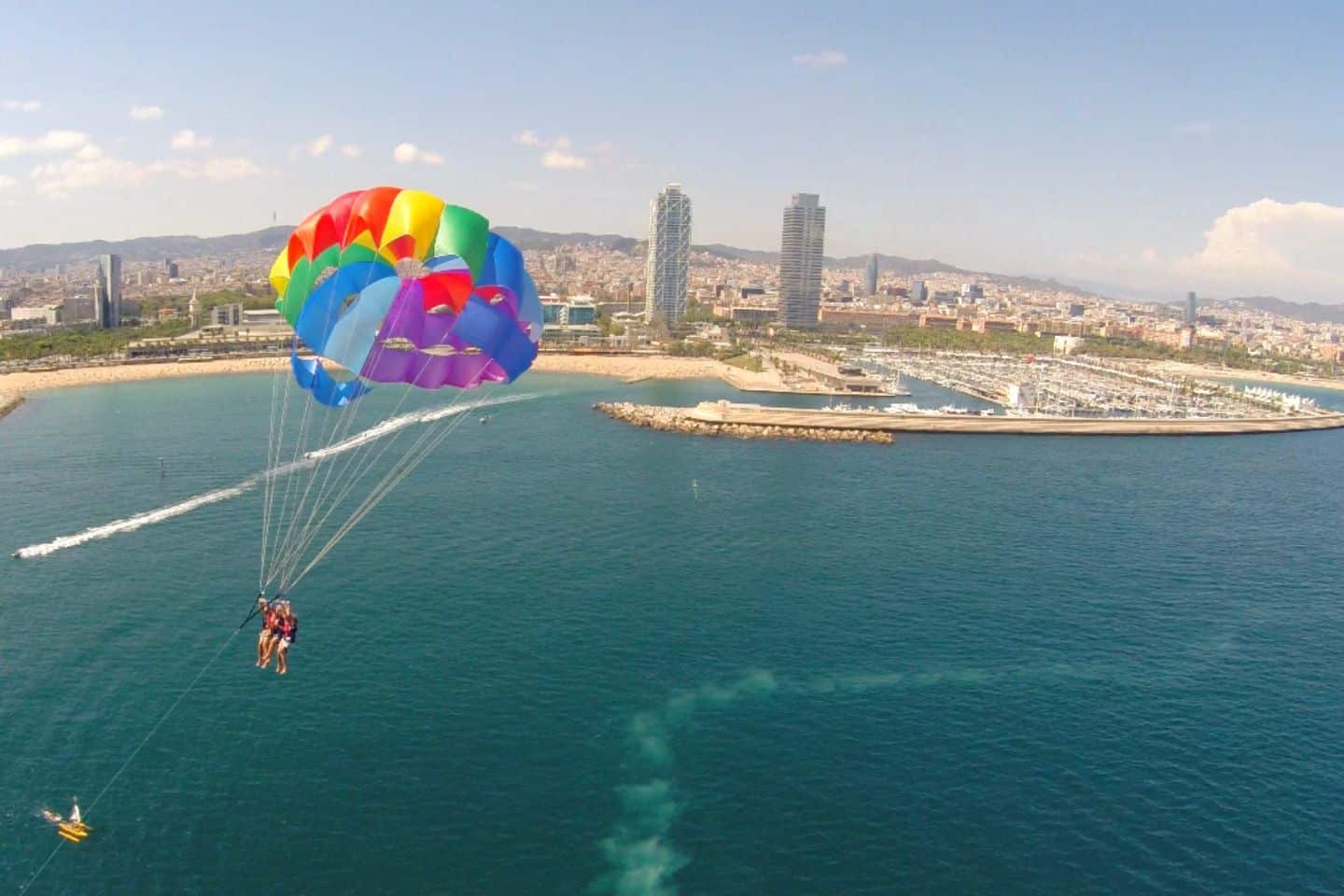 aerial view of parasailing in barcelona