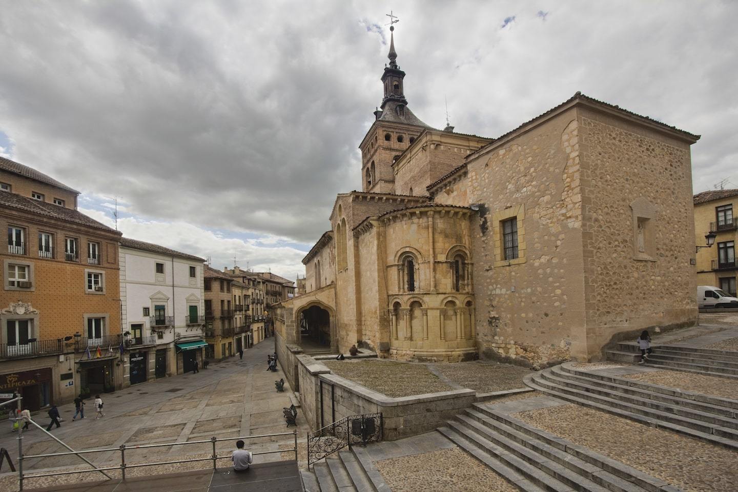 large church, steps and town square on cloudy day