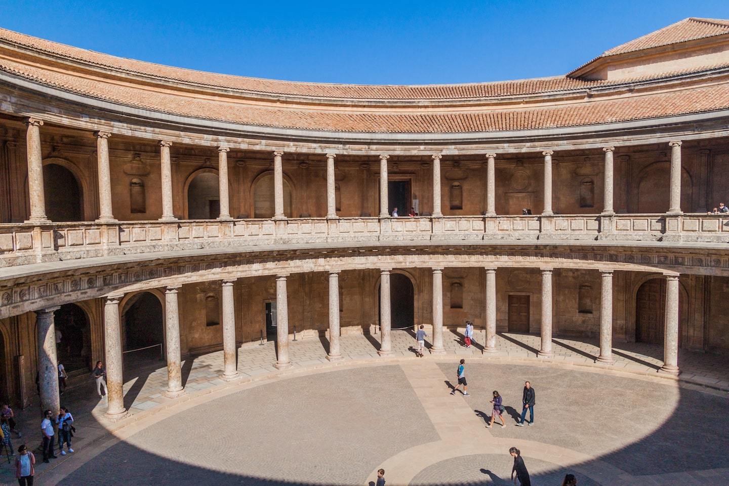 circular structure with pillars and openings around a central courtyard