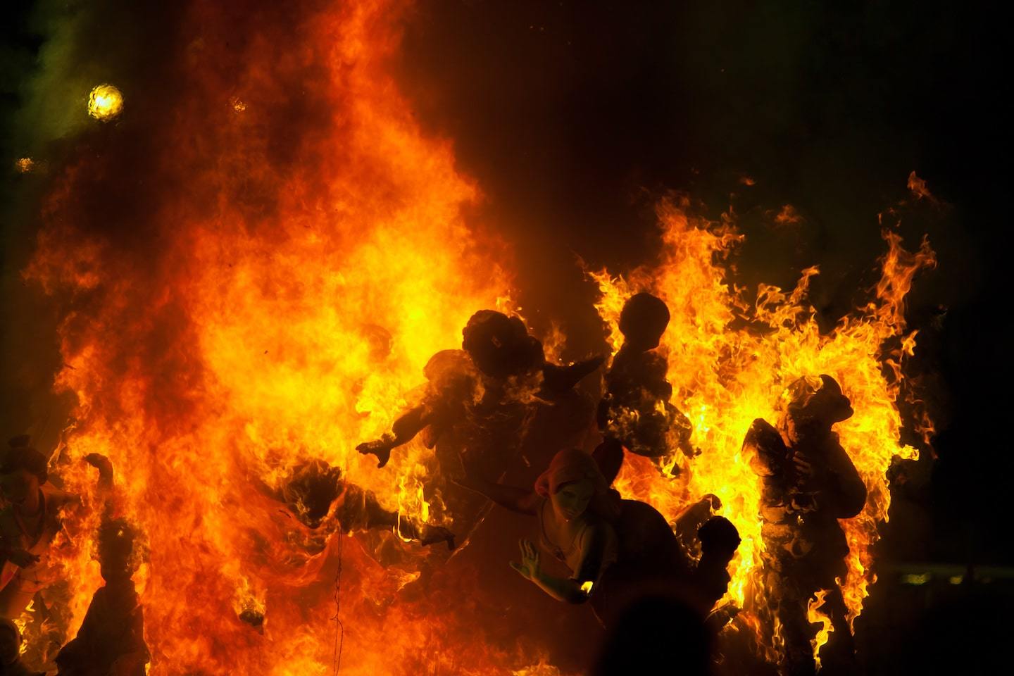 a huge bonfire in celebration of las fallas in Spain