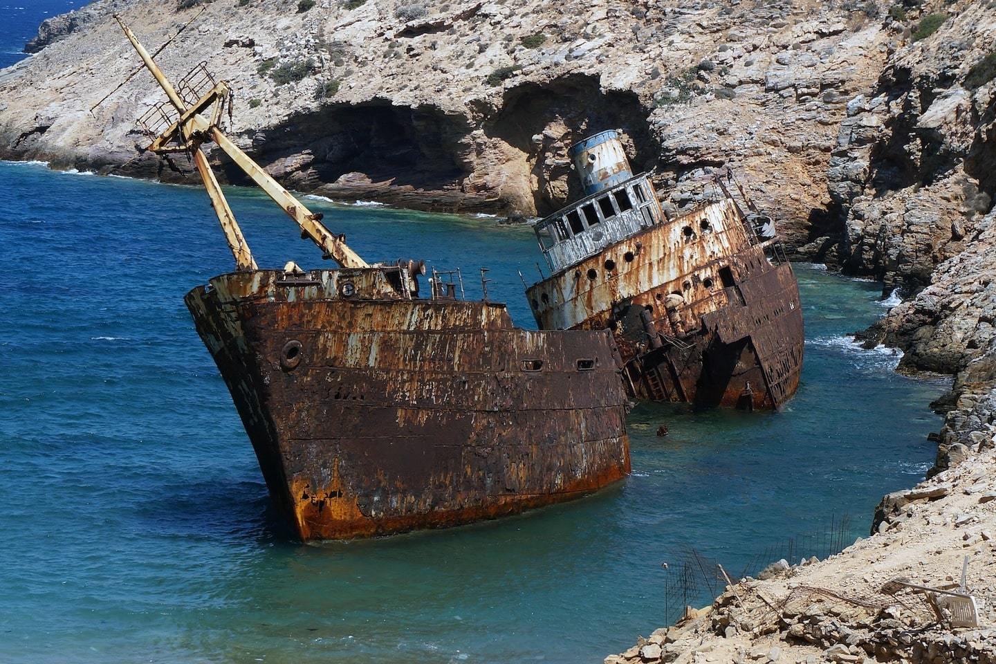 rusty shipwreck near shore in Amorgos greece