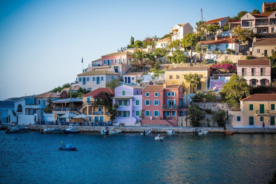 Colorful houses above the sea in Greece