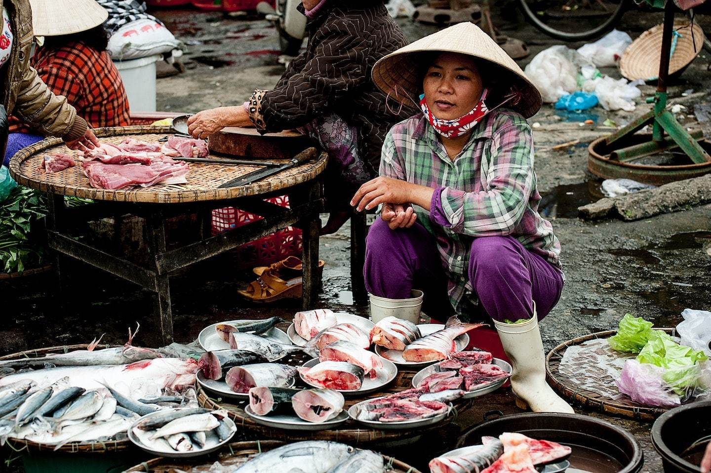 woman selling fish at the market