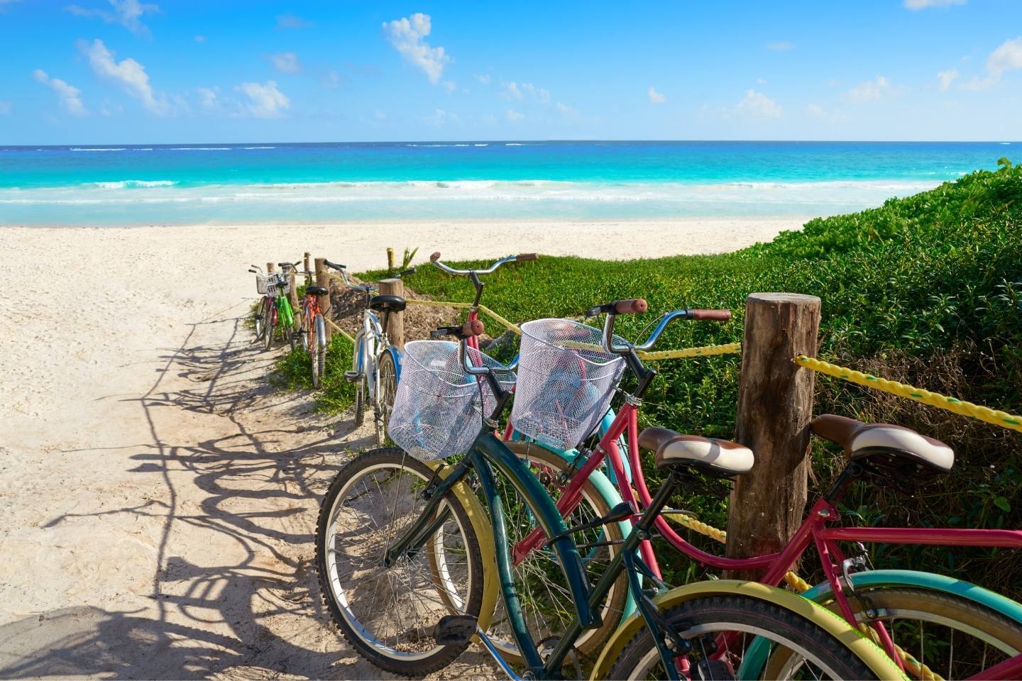 bicycles along beach in tulum