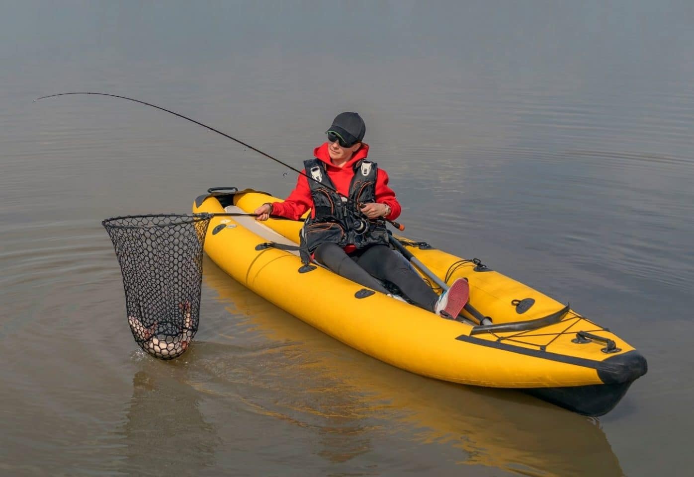 Kayak fishing on lake