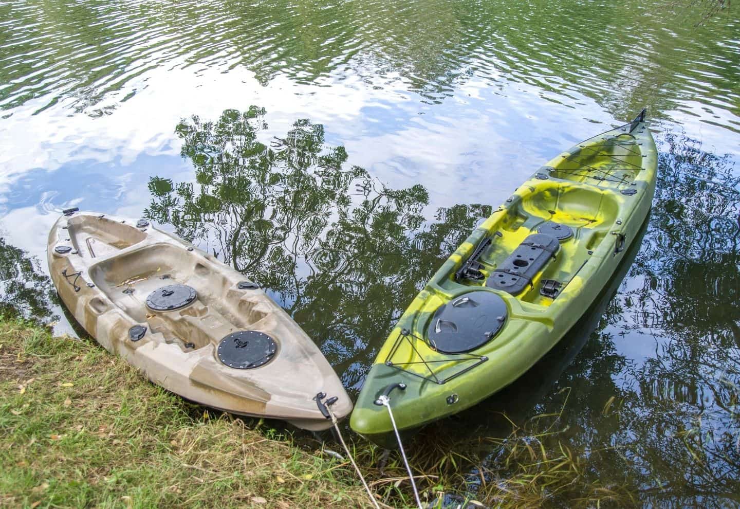 Two single seat fishing kayak on the river