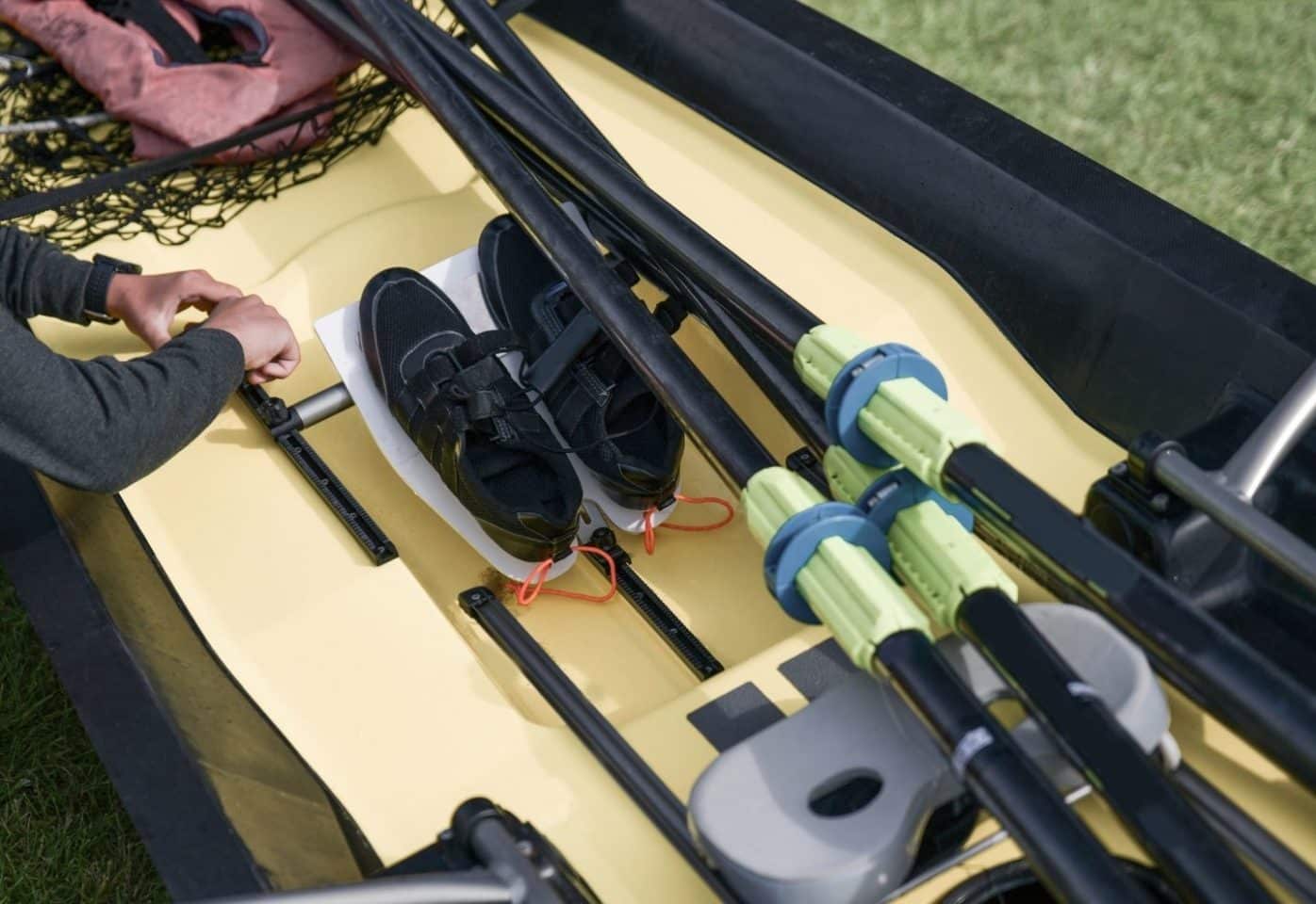Kayaking shoes in the yellow kayak