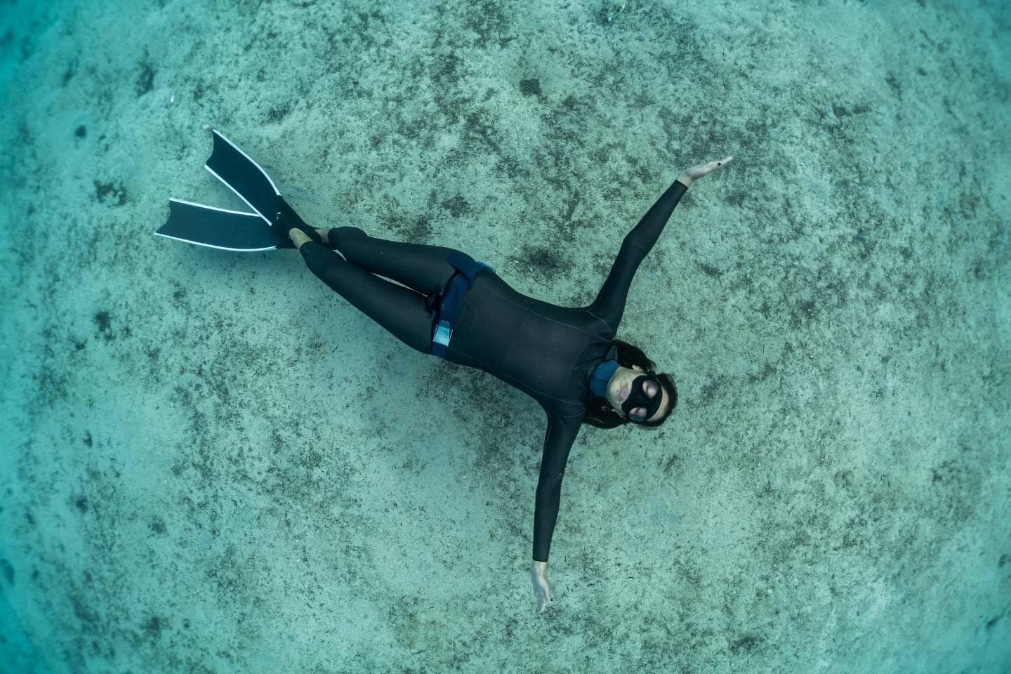 Freediver girl under the sea