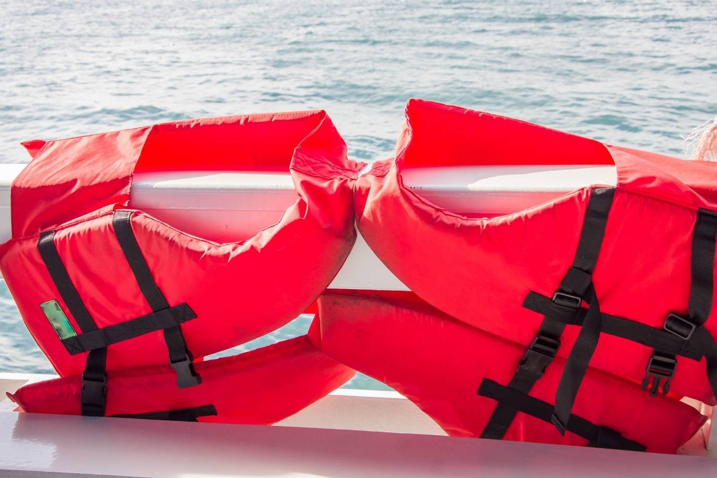 Two red life jackets