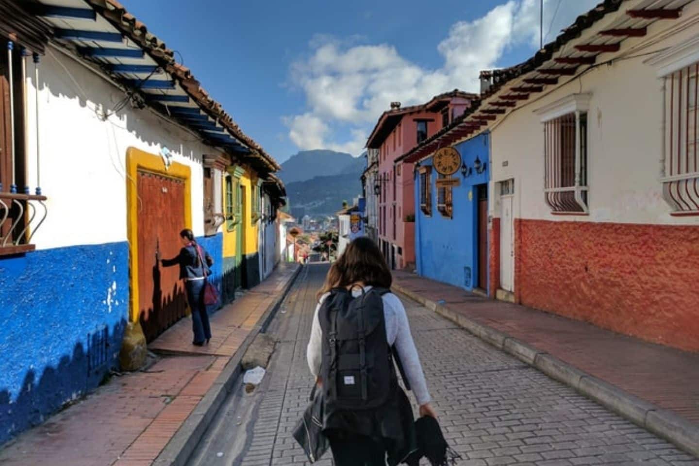 A lady travel in the street of La Candelaria Bogota