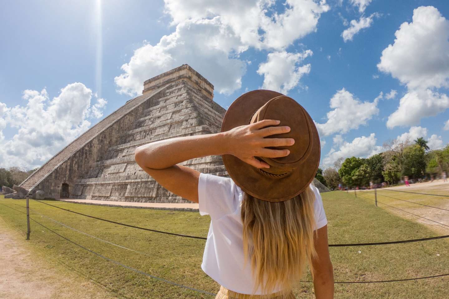 An image of woman walking on a sunny weather in Mexico