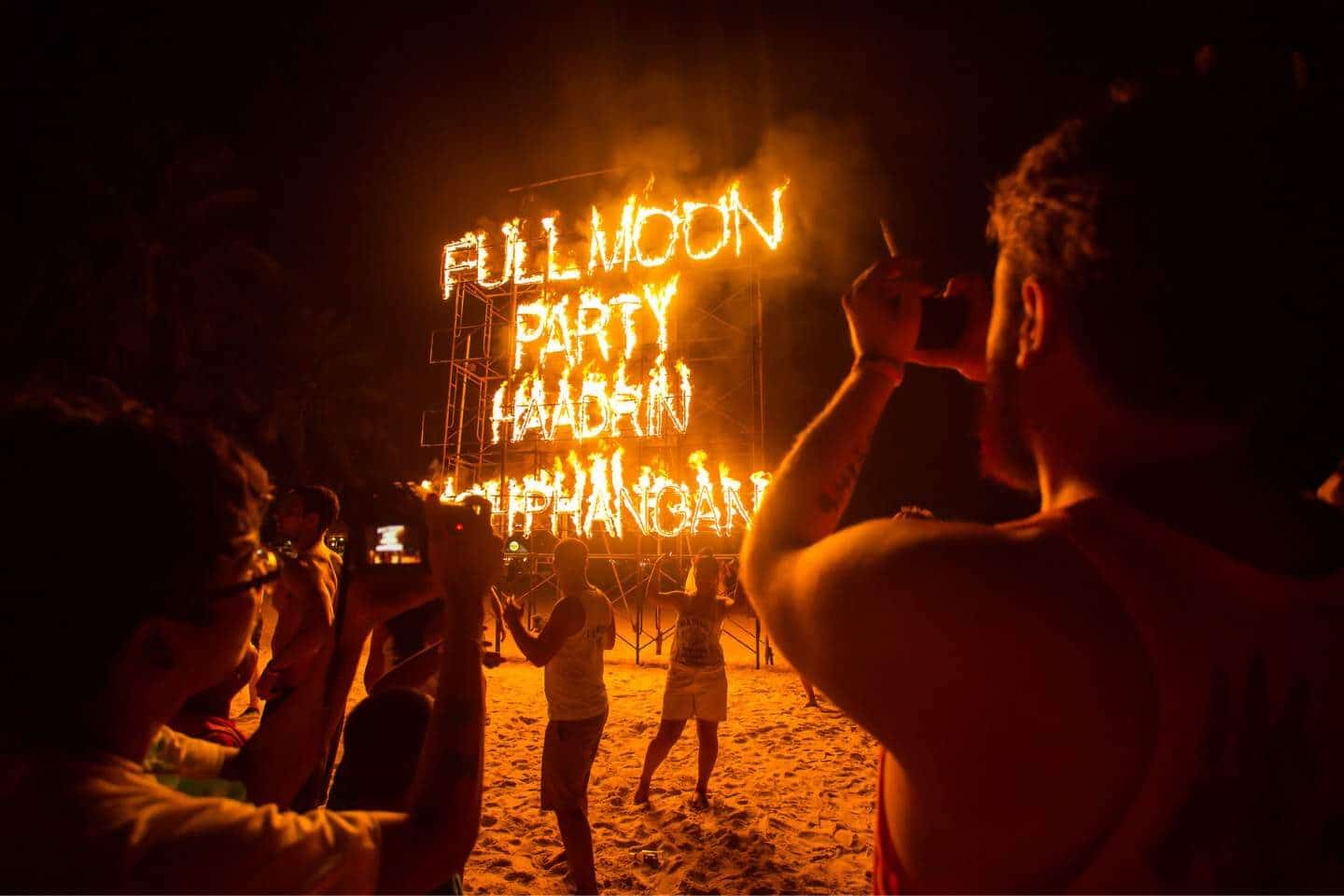 Full moon party fire sign on