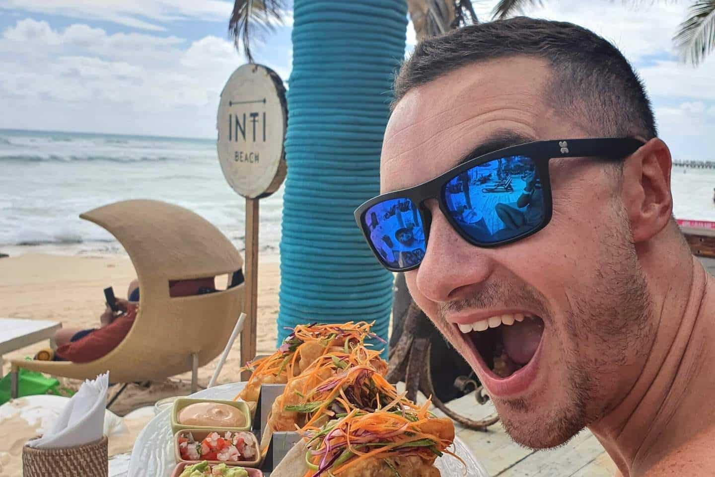 tom enjoying tacos