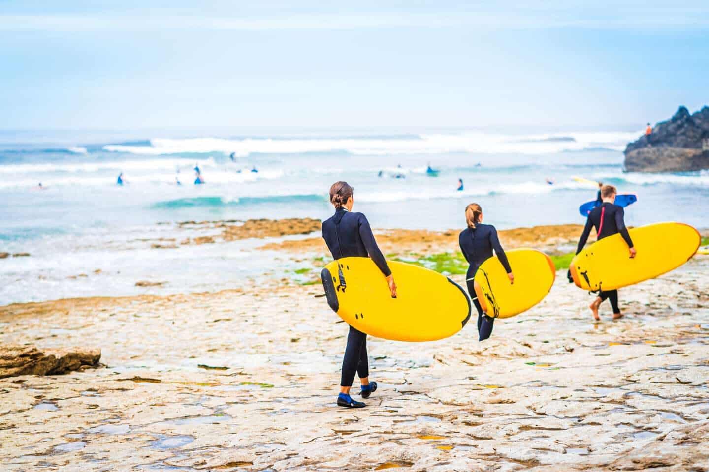 Group of surfer at the beach of Ribeira d'Ilhas