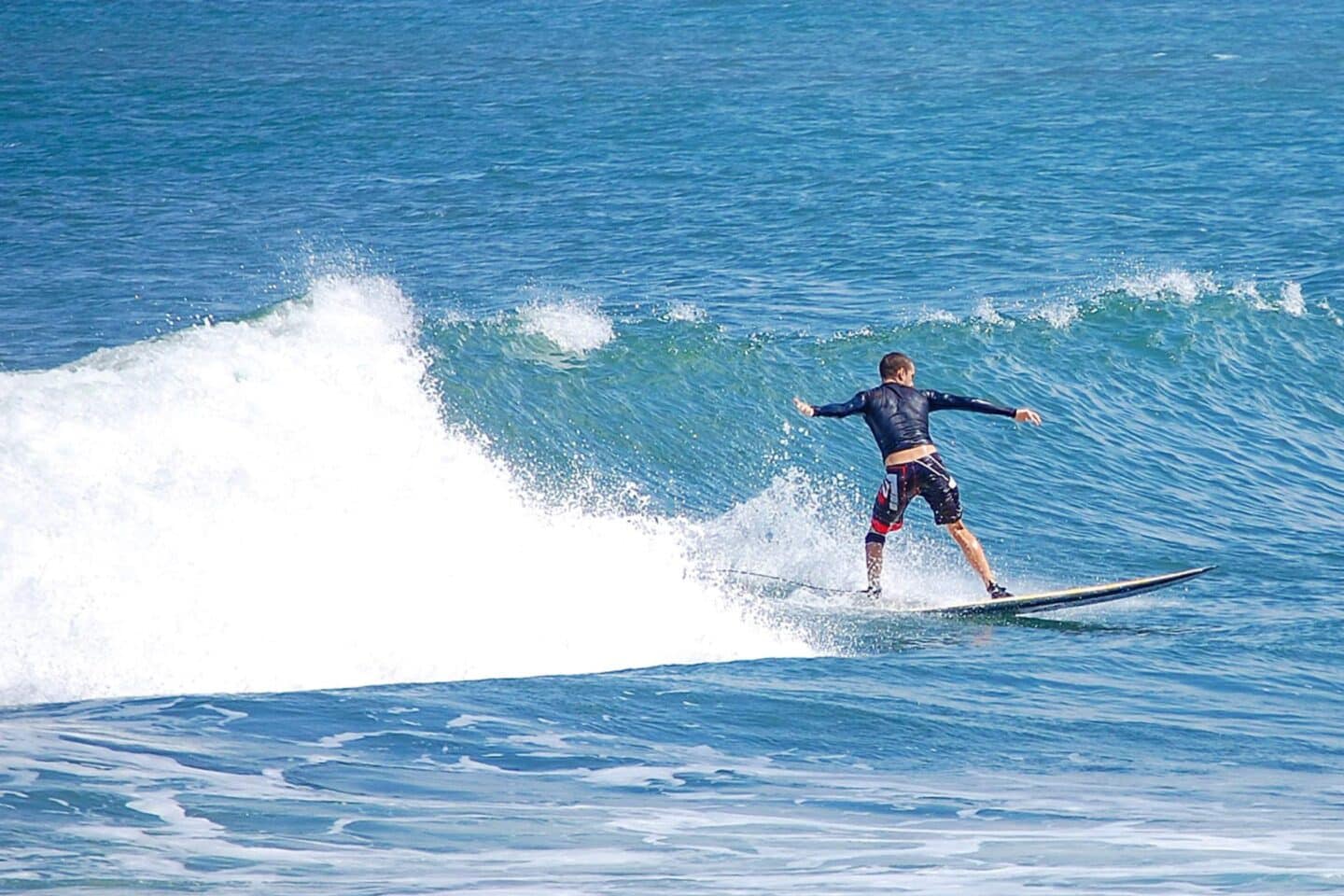 Tom surfing in Medewi