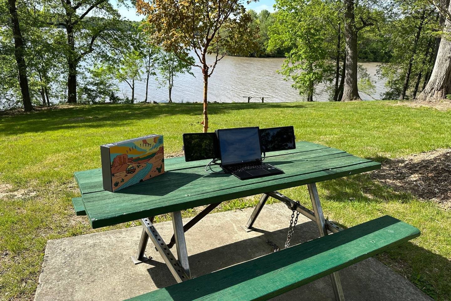 Xebec Tri-Screen 2 on a green picnic table