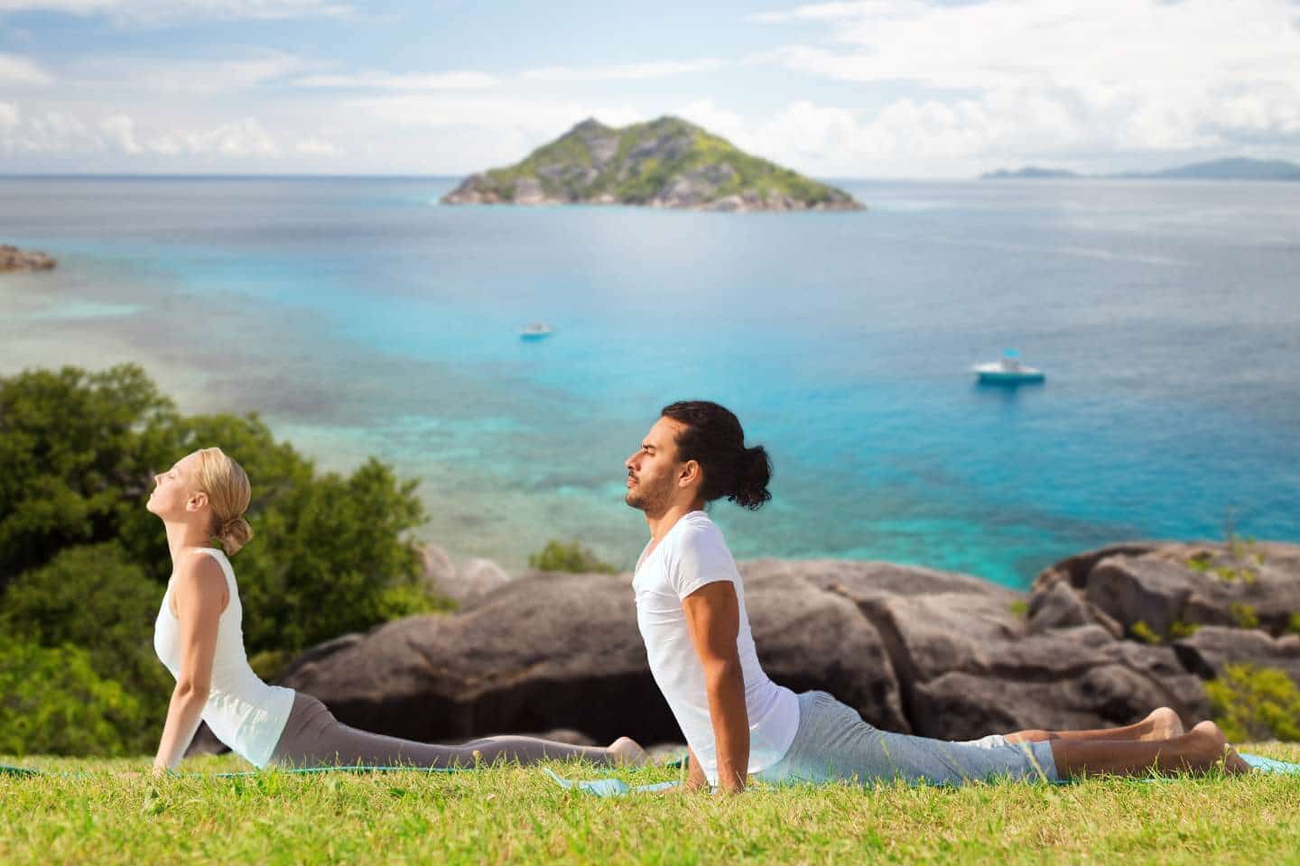 couple doing a yoga in nature