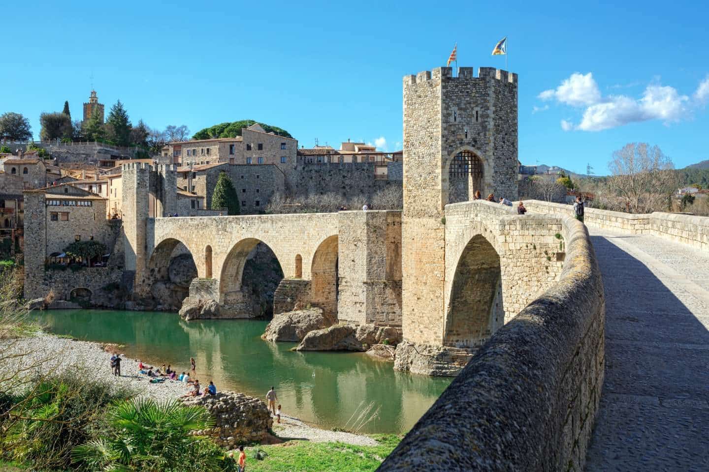 old bridge over the river fluvia in medieval town of Besalú province Girona Spain