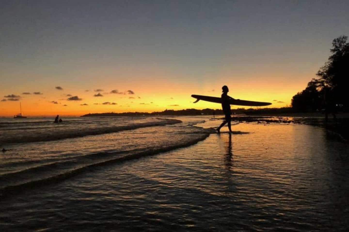 Surfing during sunset or sunrise in Sri Lanka