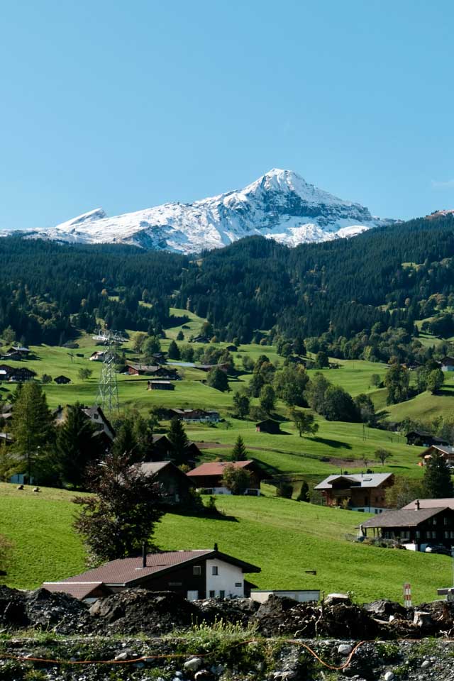 grindelwald on a sunny day with mountain views in the background